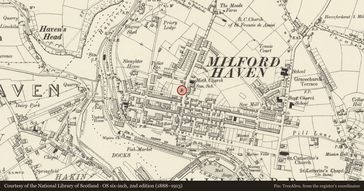 Ordnance Survey six-inch map, 2nd edition (1888–1913) covering the location of The Friends Meeting House, including boundary wall with doorway and ironwork gates plus railings, Milford Haven, Pembrokeshire, with a pin at the register's coordinates