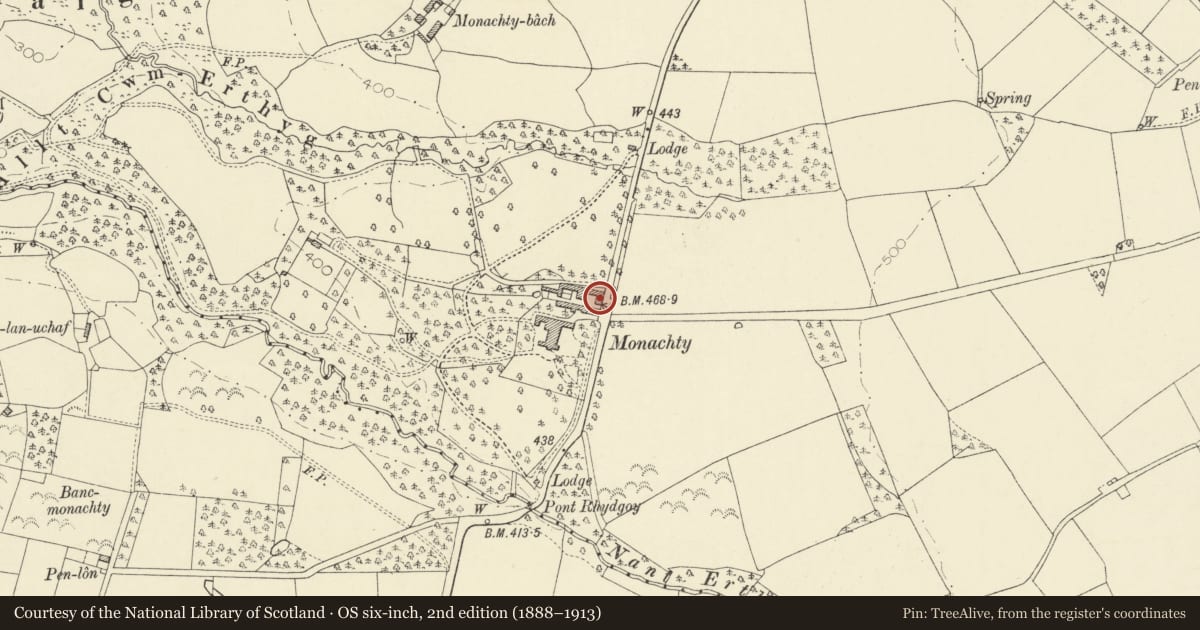 Ordnance Survey six-inch map, 2nd edition (1888–1913) covering the location of E range of farmyard at Monachty, Dyffryn Arth, Ceredigion, with a pin at the register's coordinates