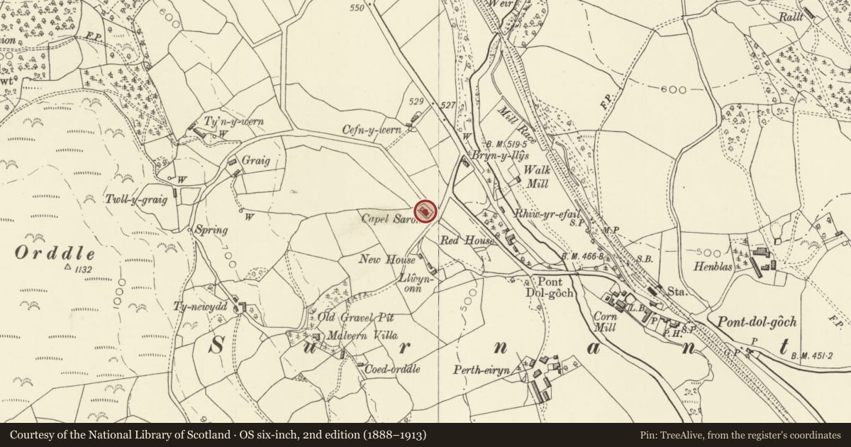 Ordnance Survey six-inch map, 2nd edition (1888–1913) covering the location of Capel Saron MC with Caretaker's House, and enclosing railings, Caersws, Powys, with a pin at the register's coordinates