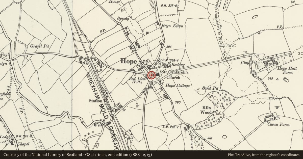 Ordnance Survey six-inch map, 2nd edition (1888–1913) covering the location of Railed Tomb Monument 30m NW of St Cyngar's Church, Hope, Flintshire, with a pin at the register's coordinates