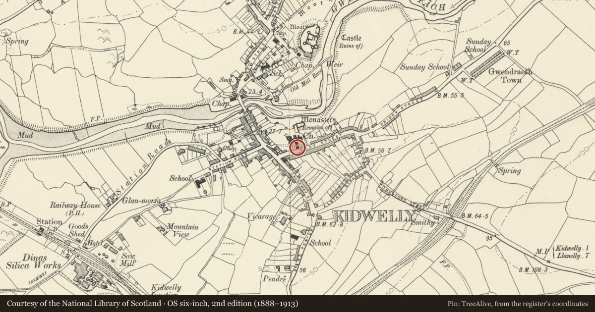Ordnance Survey six-inch map, 2nd edition (1888–1913) covering the location of Wall along S side of churchyard, Kidwelly, Carmarthenshire, with a pin at the register's coordinates