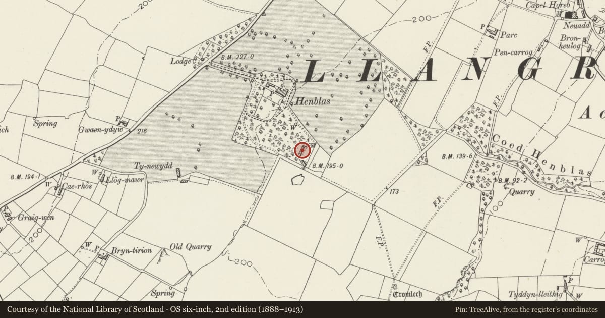 Ordnance Survey six-inch map, 2nd edition (1888–1913) covering the location of Stable range, Henblas, Llangristiolus, Isle of Anglesey, with a pin at the register's coordinates