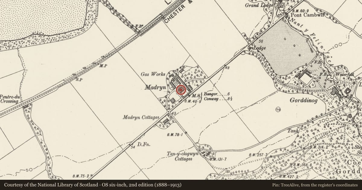 Ordnance Survey six-inch map, 2nd edition (1888–1913) covering the location of Stable range in yard at Madryn Farm, Aber, Gwynedd, with a pin at the register's coordinates
