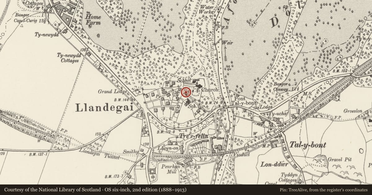 Ordnance Survey six-inch map, 2nd edition (1888–1913) covering the location of Gate piers, gates, walls and railings to churchyard, Llandygai, Gwynedd, with a pin at the register's coordinates