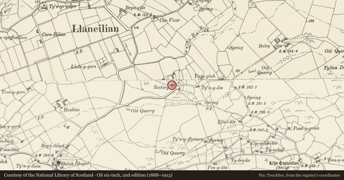 Ordnance Survey six-inch map, 2nd edition (1888–1913) covering the location of Courtyard walls and outbuilding to rear of Rectory, Llaneilian, Isle of Anglesey, with a pin at the register's coordinates