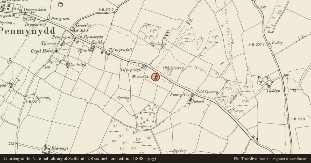 Ordnance Survey six-inch map, 2nd edition (1888–1913) covering the location of Lewis Rogers Almshouses, Penmynydd, Isle of Anglesey, with a pin at the register's coordinates