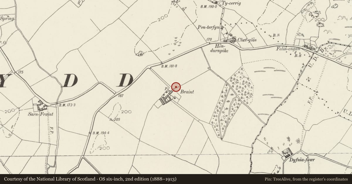 Ordnance Survey six-inch map, 2nd edition (1888–1913) covering the location of Pig rearing unit at Braint, Penmynydd, Isle of Anglesey, with a pin at the register's coordinates