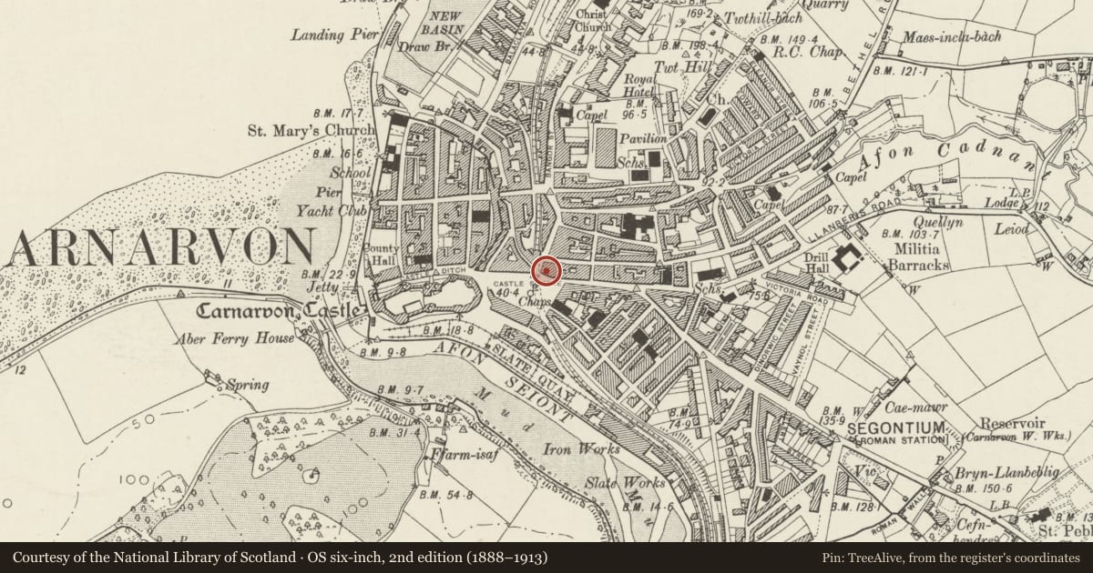 Ordnance Survey six-inch map, 2nd edition (1888–1913) covering the location of Castle Pharmacy, Caernarfon, Gwynedd, with a pin at the register's coordinates