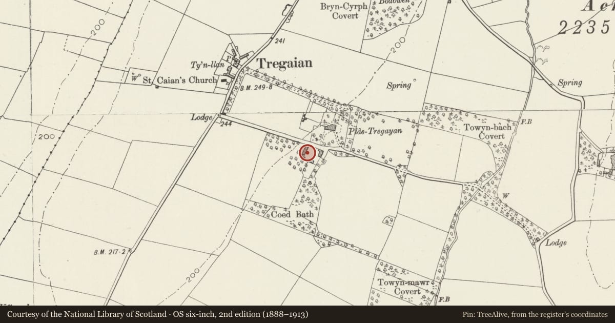 Ordnance Survey six-inch map, 2nd edition (1888–1913) covering the location of Stable range at Plas Tregayan, Llanddyfnan, Isle of Anglesey, with a pin at the register's coordinates