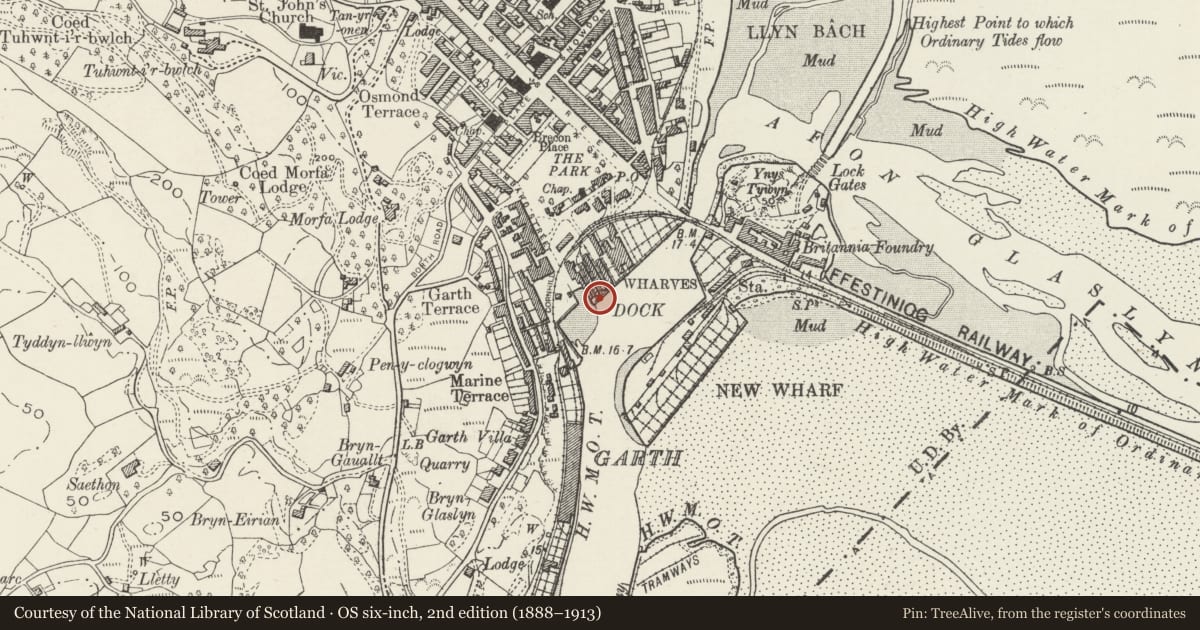 Ordnance Survey six-inch map, 2nd edition (1888–1913) covering the location of Greaves Wharf and Oakleys Wharf, Porthmadog, Gwynedd, with a pin at the register's coordinates