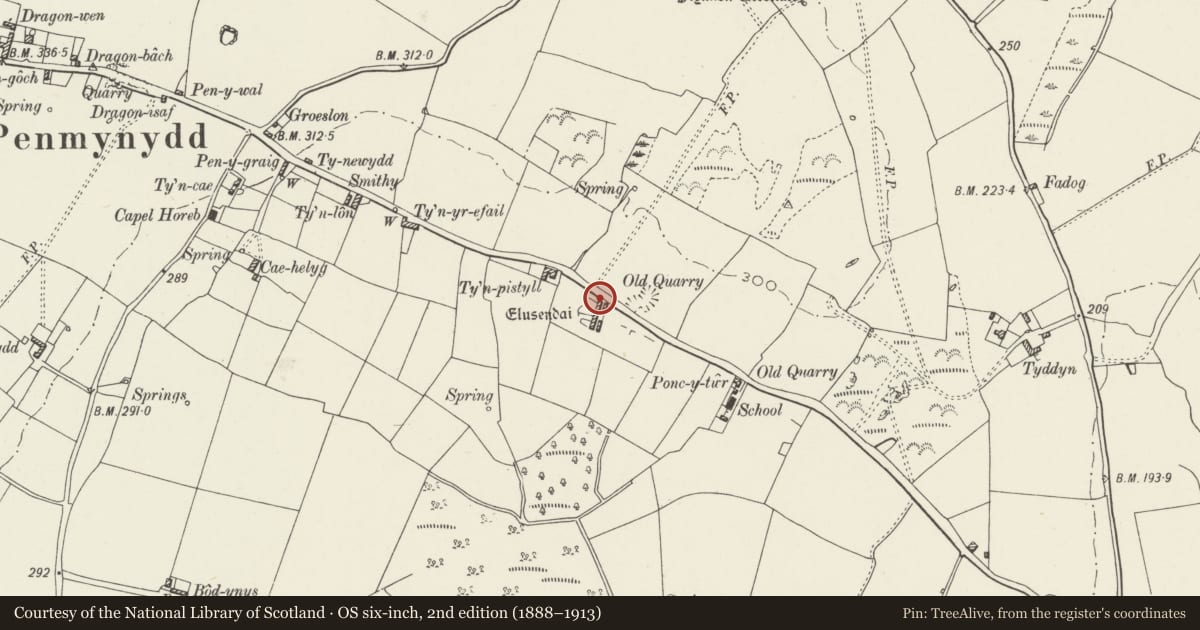 Ordnance Survey six-inch map, 2nd edition (1888–1913) covering the location of Lewis Rogers Almshouses, Penmynydd, Isle of Anglesey, with a pin at the register's coordinates