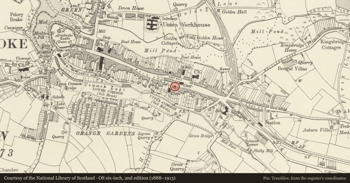Ordnance Survey six-inch map, 2nd edition (1888–1913) covering the location of No 93 and forecourt railings, Pembroke, Pembrokeshire, with a pin at the register's coordinates