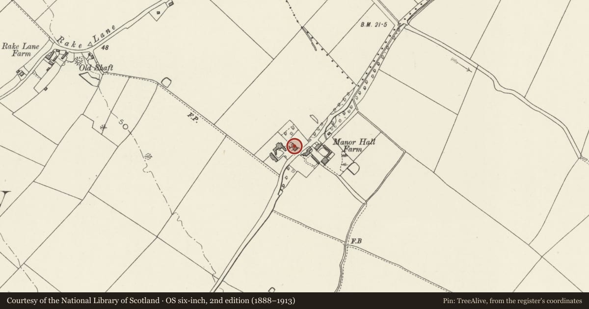 Ordnance Survey six-inch map, 2nd edition (1888–1913) covering the location of Manor Farm, Broughton and Bretton, Flintshire, with a pin at the register's coordinates