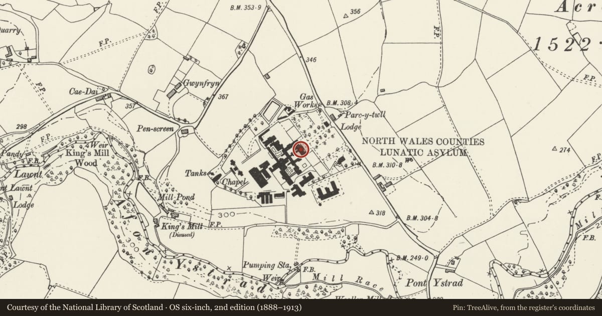 Ordnance Survey six-inch map, 2nd edition (1888–1913) covering the location of North Wales Hospital: Primary Range, including adjoining walled 'Airing Courts' to NW and SE, Denbigh, Denbighshire, with a pin at the register's coordinates