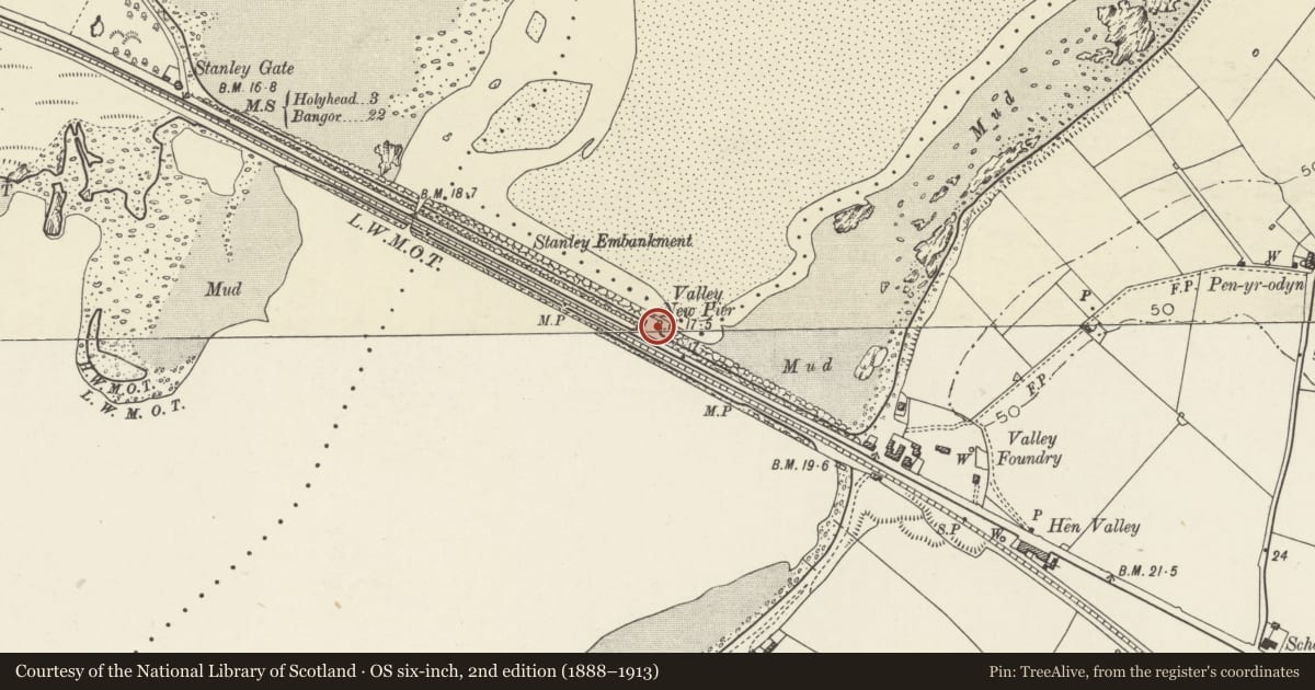 Ordnance Survey six-inch map, 2nd edition (1888–1913) covering the location of The Holyhead Road: quay on the Stanley Embankment, Valley, Isle of Anglesey, with a pin at the register's coordinates